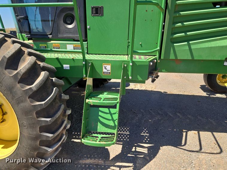 image for item EW0137 2012 John Deere R450 swather / windrower