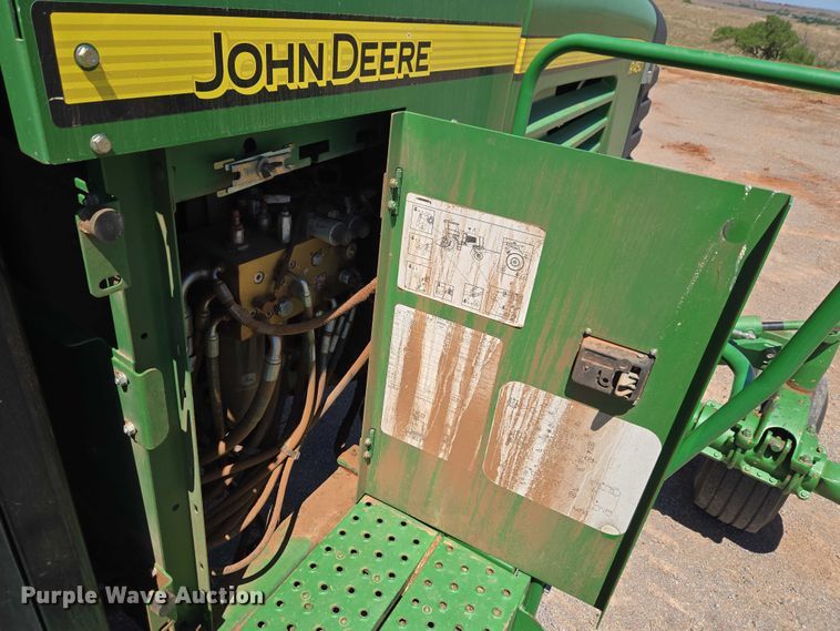 image for item EW0137 2012 John Deere R450 swather / windrower