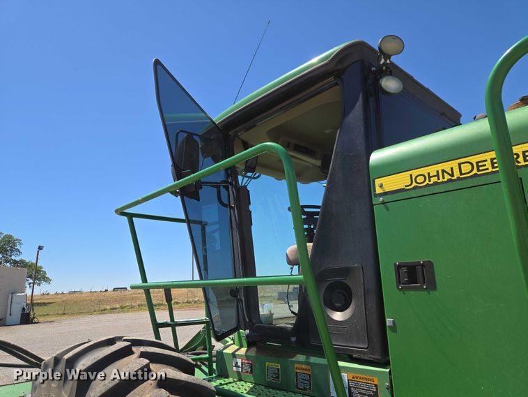 image for item EW0137 2012 John Deere R450 swather / windrower