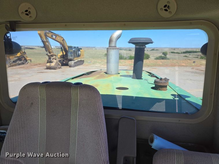 image for item EW0137 2012 John Deere R450 swather / windrower