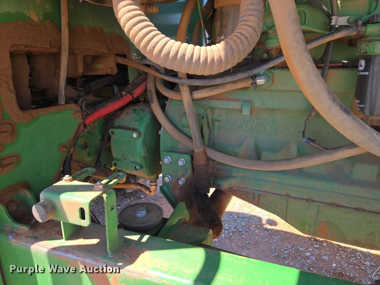 image for item EW0137 2012 John Deere R450 swather / windrower