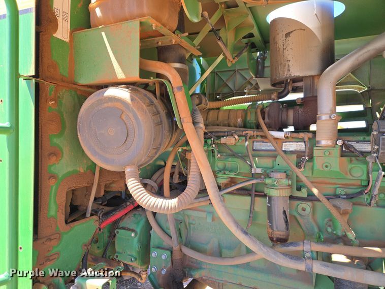 image for item EW0137 2012 John Deere R450 swather / windrower