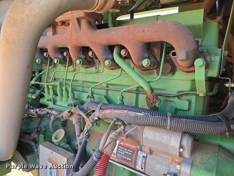 image for item EW0137 2012 John Deere R450 swather / windrower