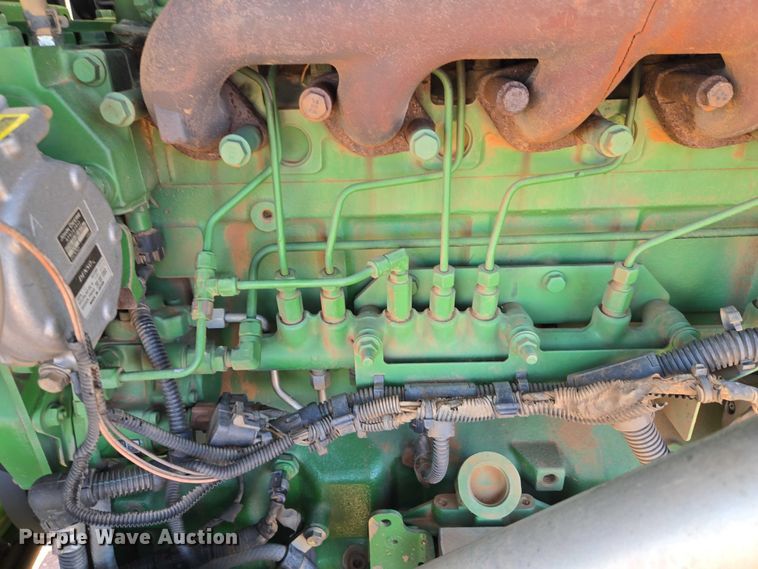 image for item EW0137 2012 John Deere R450 swather / windrower