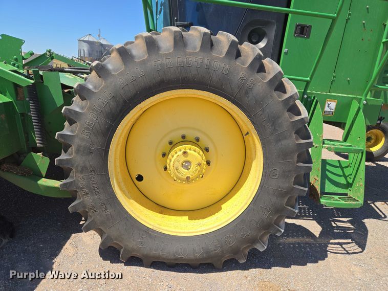 image for item EW0137 2012 John Deere R450 swather / windrower
