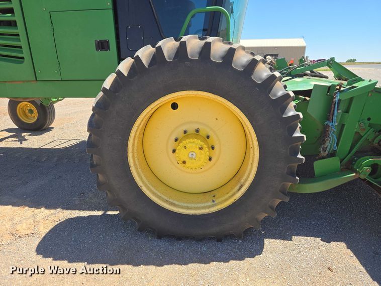 image for item EW0137 2012 John Deere R450 swather / windrower