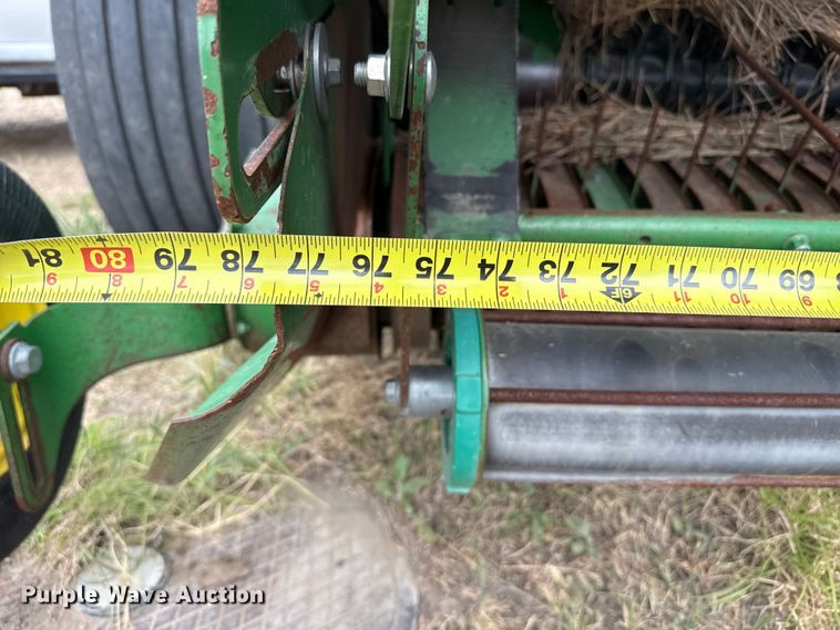 image for item EW4513 2012 John Deere 569  round baler