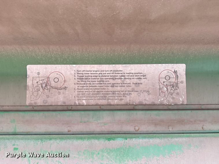 image for item EW4513 2012 John Deere 569  round baler
