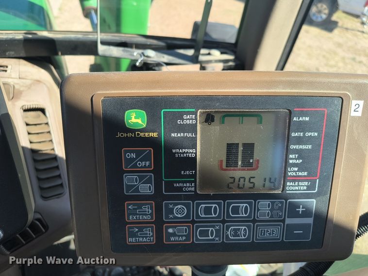 image for item EW4513 2012 John Deere 569  round baler