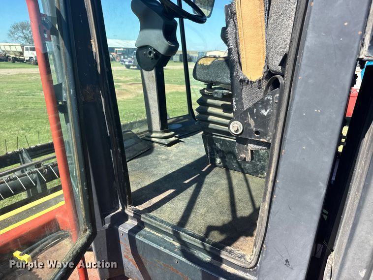 image for item FB7388 2001 New Holland HW320 swather / windrower
