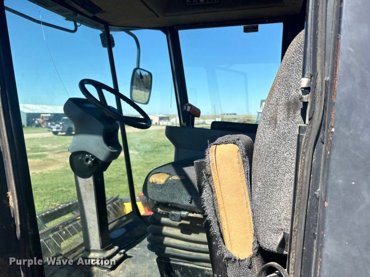 image for item FB7388 2001 New Holland HW320 swather / windrower