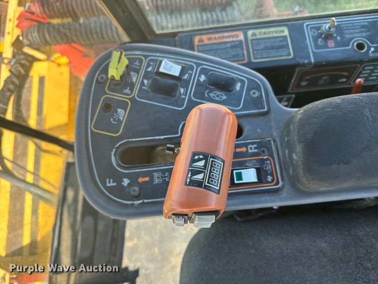 image for item FB7388 2001 New Holland HW320 swather / windrower
