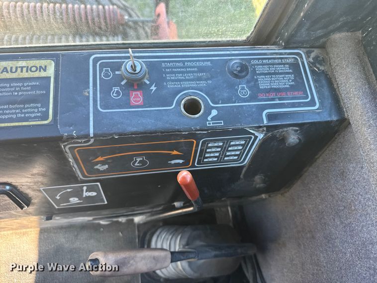 image for item FB7388 2001 New Holland HW320 swather / windrower