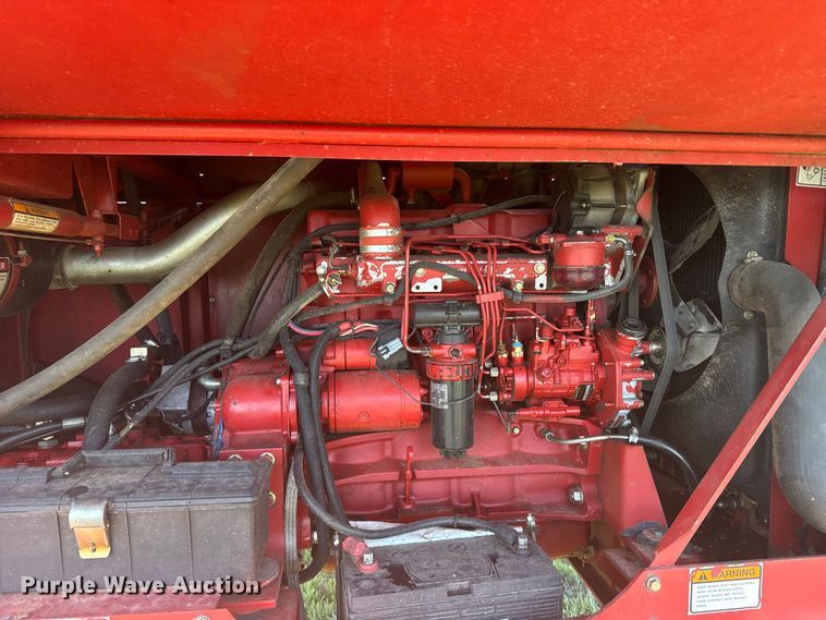 image for item FB7388 2001 New Holland HW320 swather / windrower
