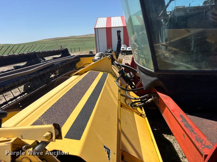 image for item FB7391 1996 Hew Holand 2550 swather / windrower