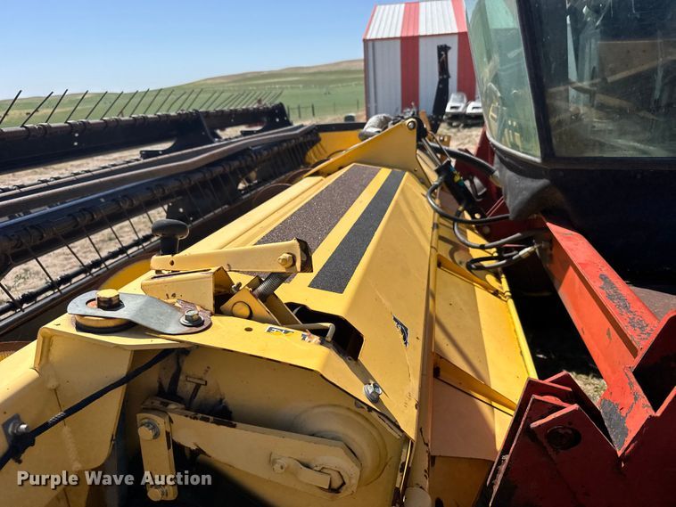 image for item FB7391 1996 Hew Holand 2550 swather / windrower
