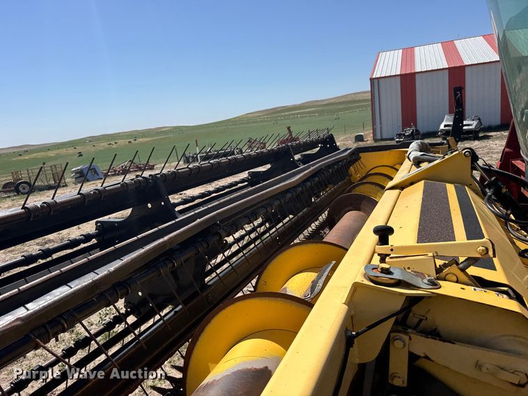 image for item FB7391 1996 Hew Holand 2550 swather / windrower