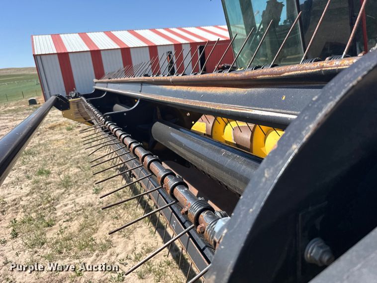 image for item FB7391 1996 Hew Holand 2550 swather / windrower