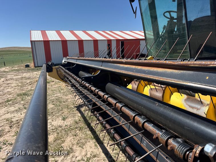 image for item FB7391 1996 Hew Holand 2550 swather / windrower