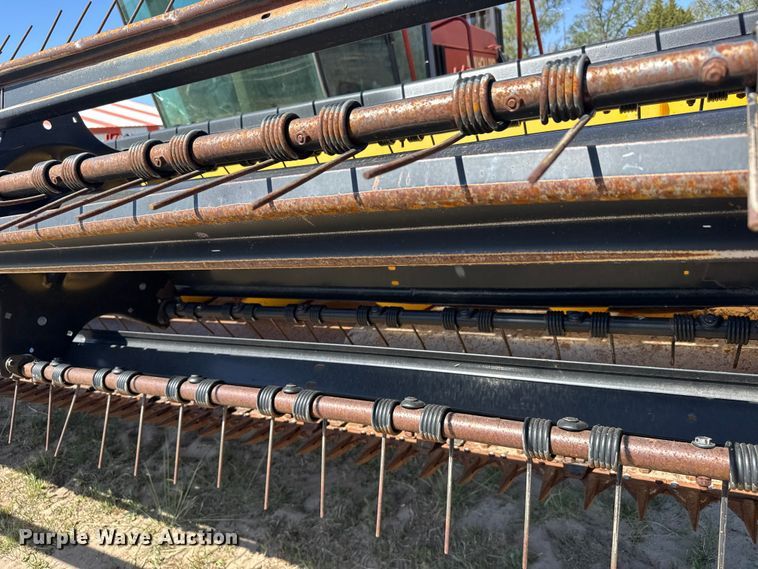 image for item FB7391 1996 Hew Holand 2550 swather / windrower