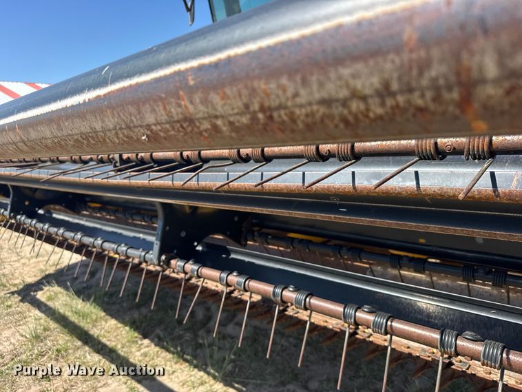 image for item FB7391 1996 Hew Holand 2550 swather / windrower