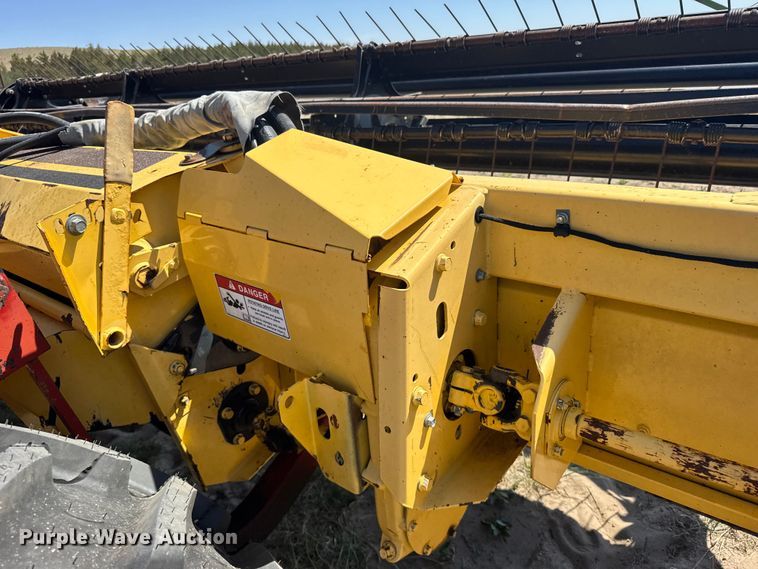image for item FB7391 1996 Hew Holand 2550 swather / windrower