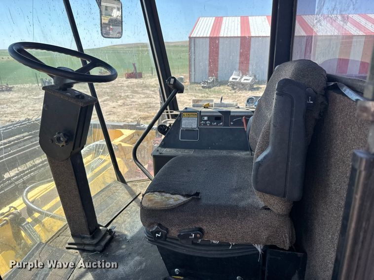 image for item FB7391 1996 Hew Holand 2550 swather / windrower