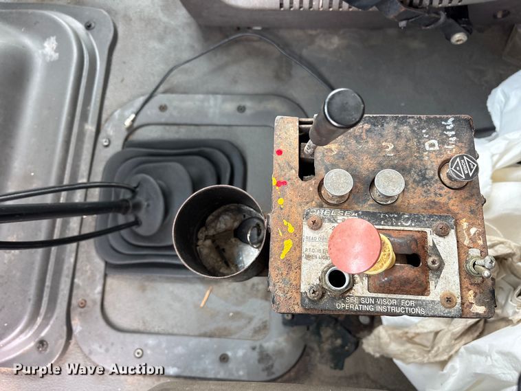 image for item ET2074 2004 Sterling L9500 winch truck