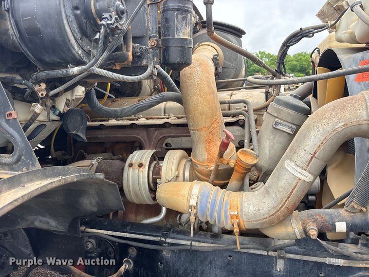 image for item ET2074 2004 Sterling L9500 winch truck