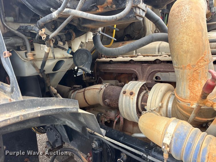 image for item ET2074 2004 Sterling L9500 winch truck