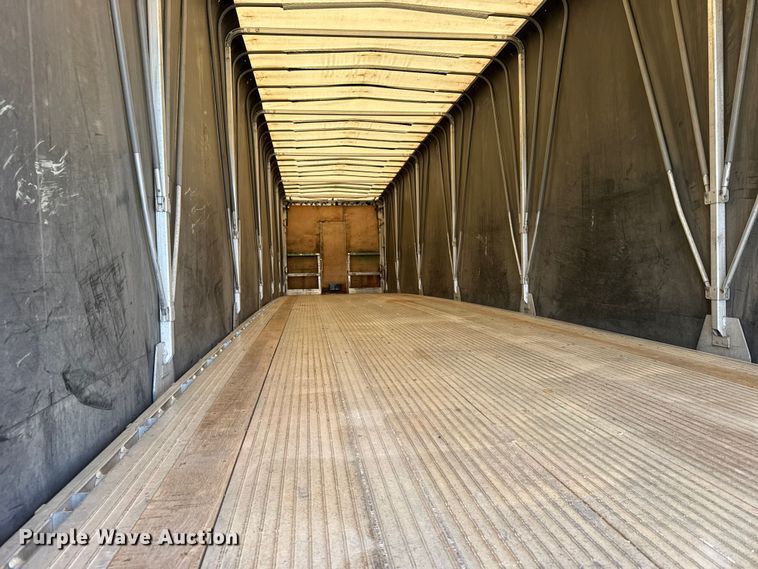 image for item FB7431 2016 MAC TNAR48AF flatbed trailer