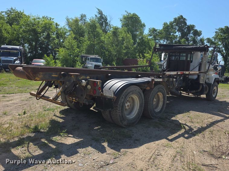 image for item FH6024 1994 Mack RD690S roll-off container truck
