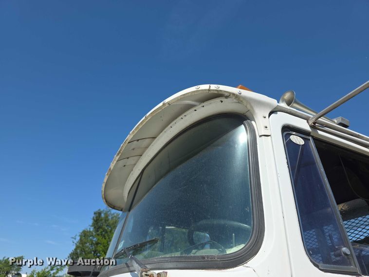 image for item FH6024 1994 Mack RD690S roll-off container truck
