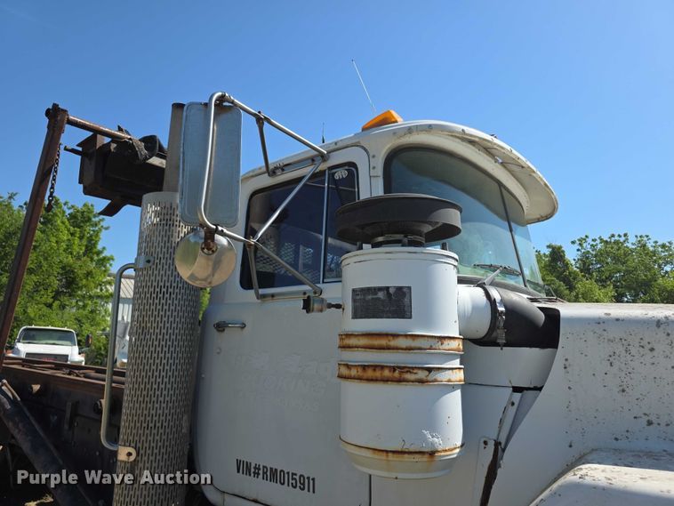 image for item FH6024 1994 Mack RD690S roll-off container truck