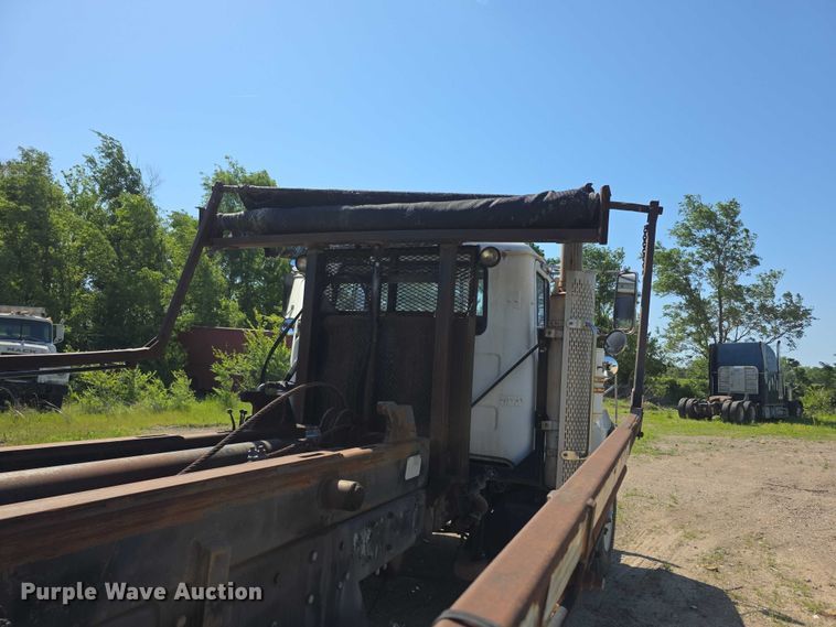 image for item FH6024 1994 Mack RD690S roll-off container truck