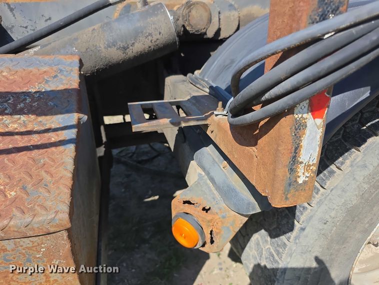 image for item FH6024 1994 Mack RD690S roll-off container truck