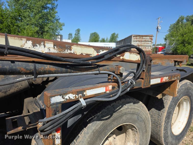 image for item FH6024 1994 Mack RD690S roll-off container truck