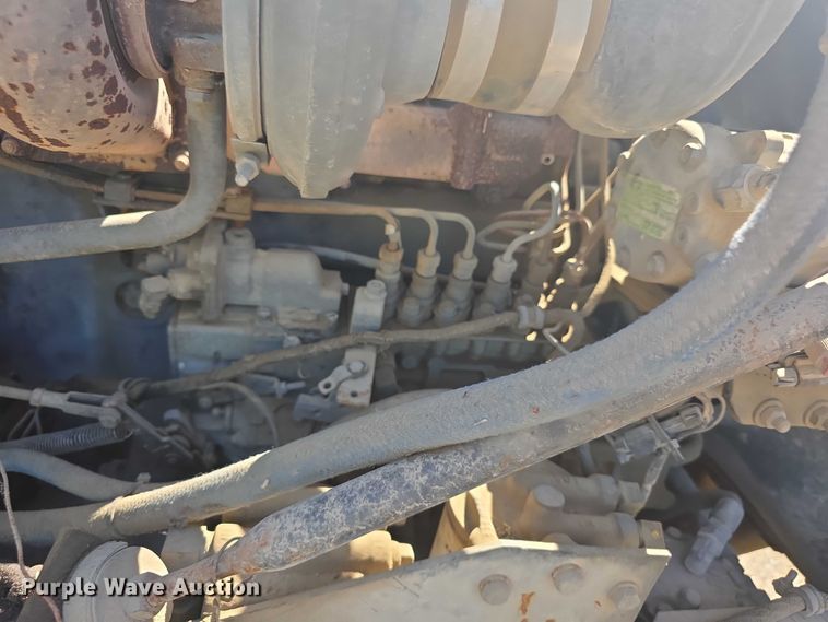 image for item FH6024 1994 Mack RD690S roll-off container truck
