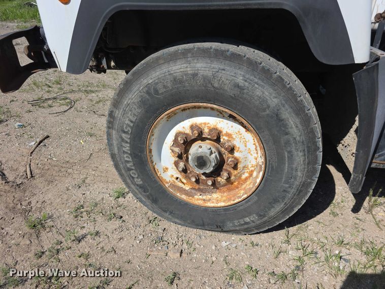 image for item FH6024 1994 Mack RD690S roll-off container truck