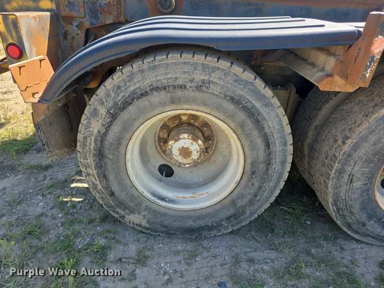 image for item FH6024 1994 Mack RD690S roll-off container truck