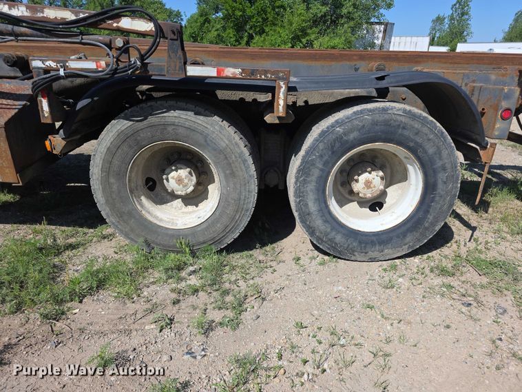 image for item FH6024 1994 Mack RD690S roll-off container truck