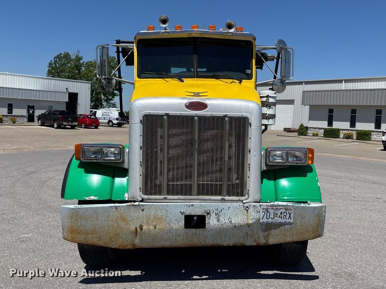image for item FH7111 2002 Peterbilt 357 roll-off container truck