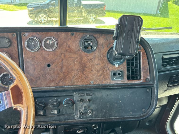 image for item FH7111 2002 Peterbilt 357 roll-off container truck