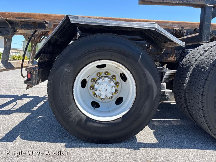 image for item FH7111 2002 Peterbilt 357 roll-off container truck