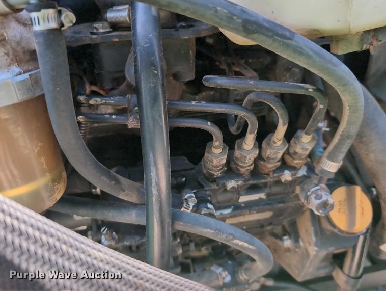 image for item DT1758 2000 John Deere 4700 MFWD tractor