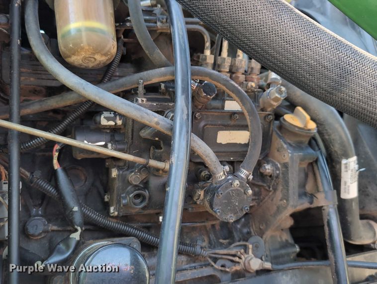 image for item DT1758 2000 John Deere 4700 MFWD tractor