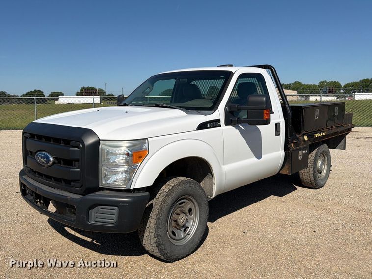 image for item EA4910 2011 Ford F250 Super Duty flatbed pickup truck