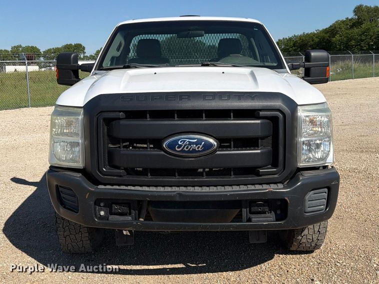 image for item EA4910 2011 Ford F250 Super Duty flatbed pickup truck