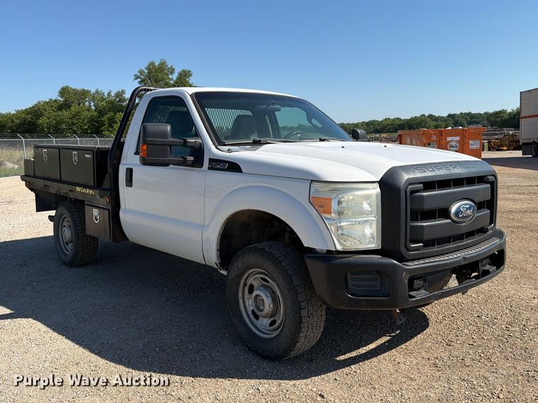 image for item EA4910 2011 Ford F250 Super Duty flatbed pickup truck