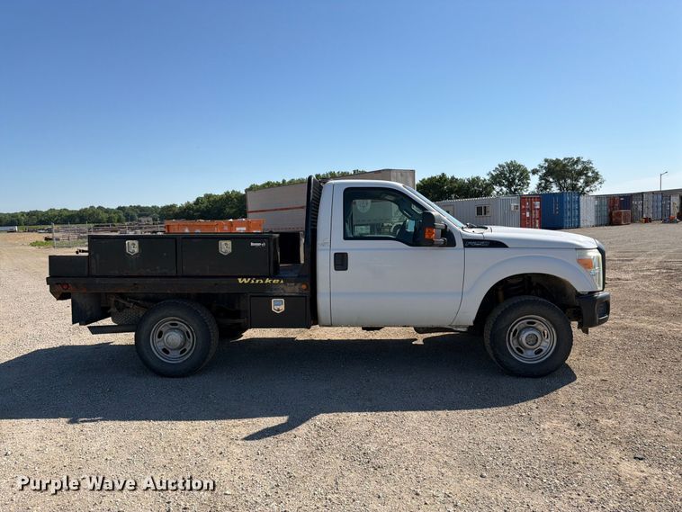 image for item EA4910 2011 Ford F250 Super Duty flatbed pickup truck